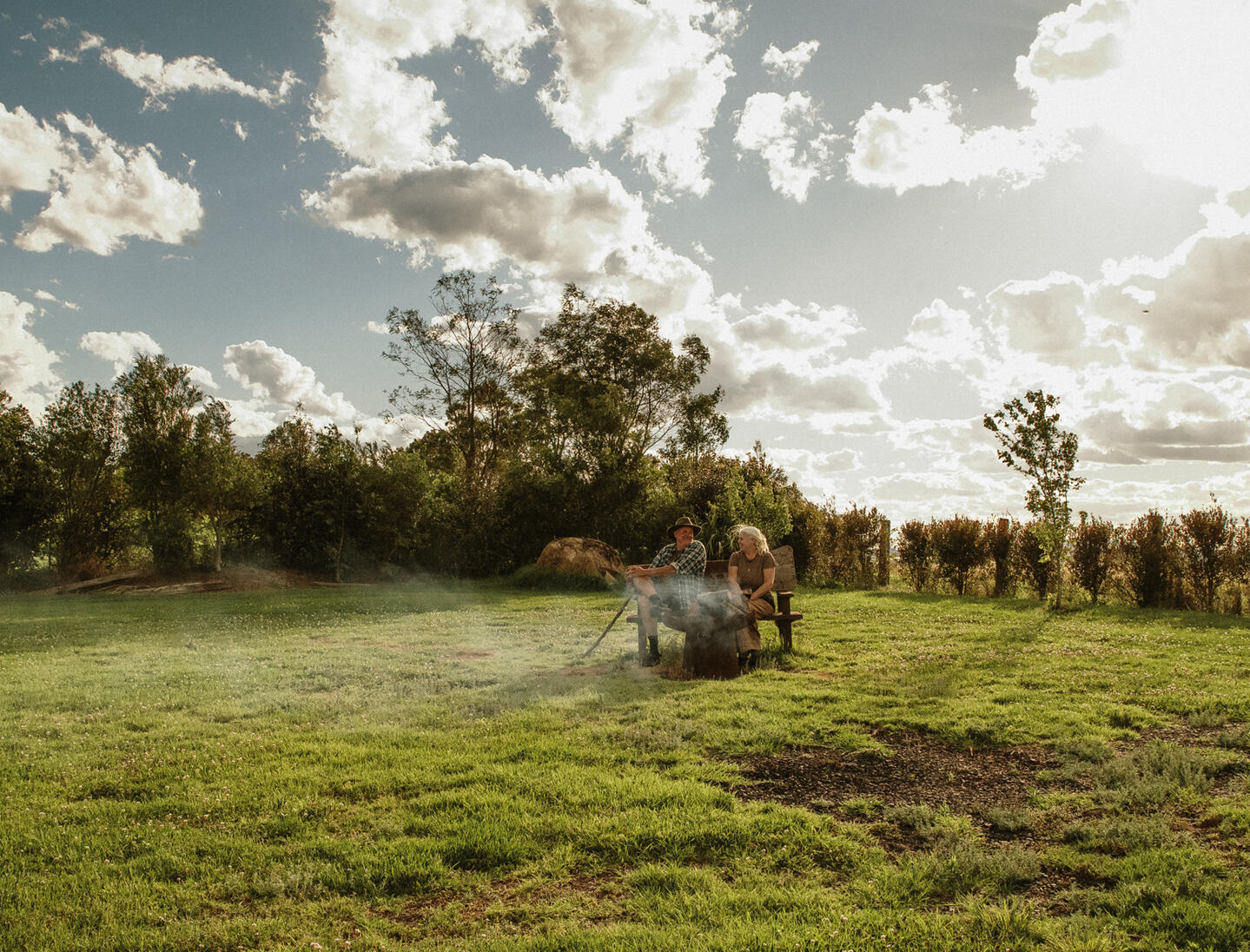 Guests enjoying the fire pit at Dorrigo Rainforest Retreat rainforest accommodation